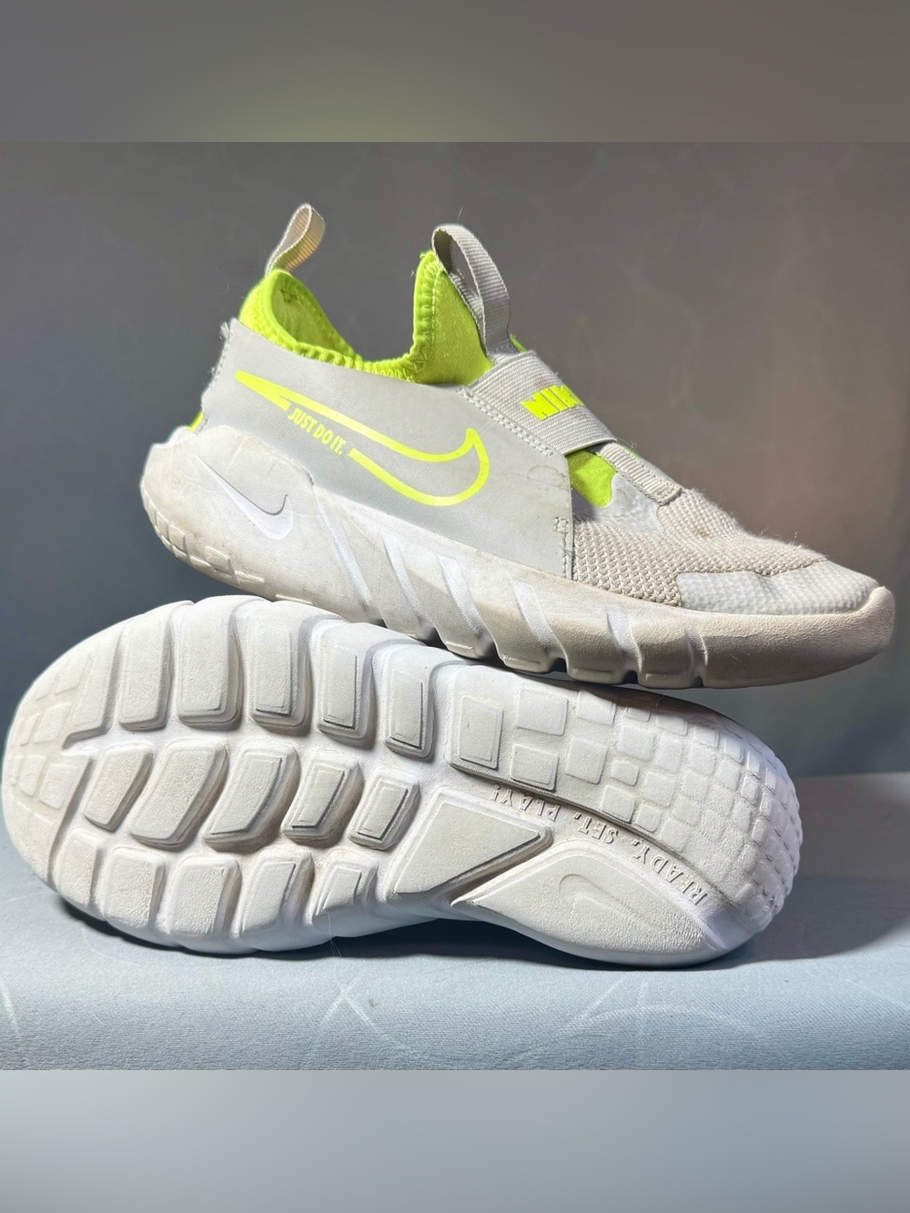 Nike Kids Slip-On Sneakers in White and Neon Yellow